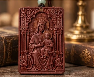 Madonna & Child — A crowned Madonna holds the Child in an ornate rectangular relief.